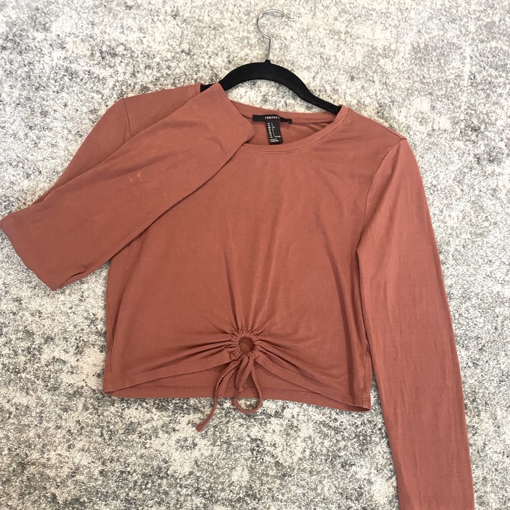 Rust crop long sleeved top